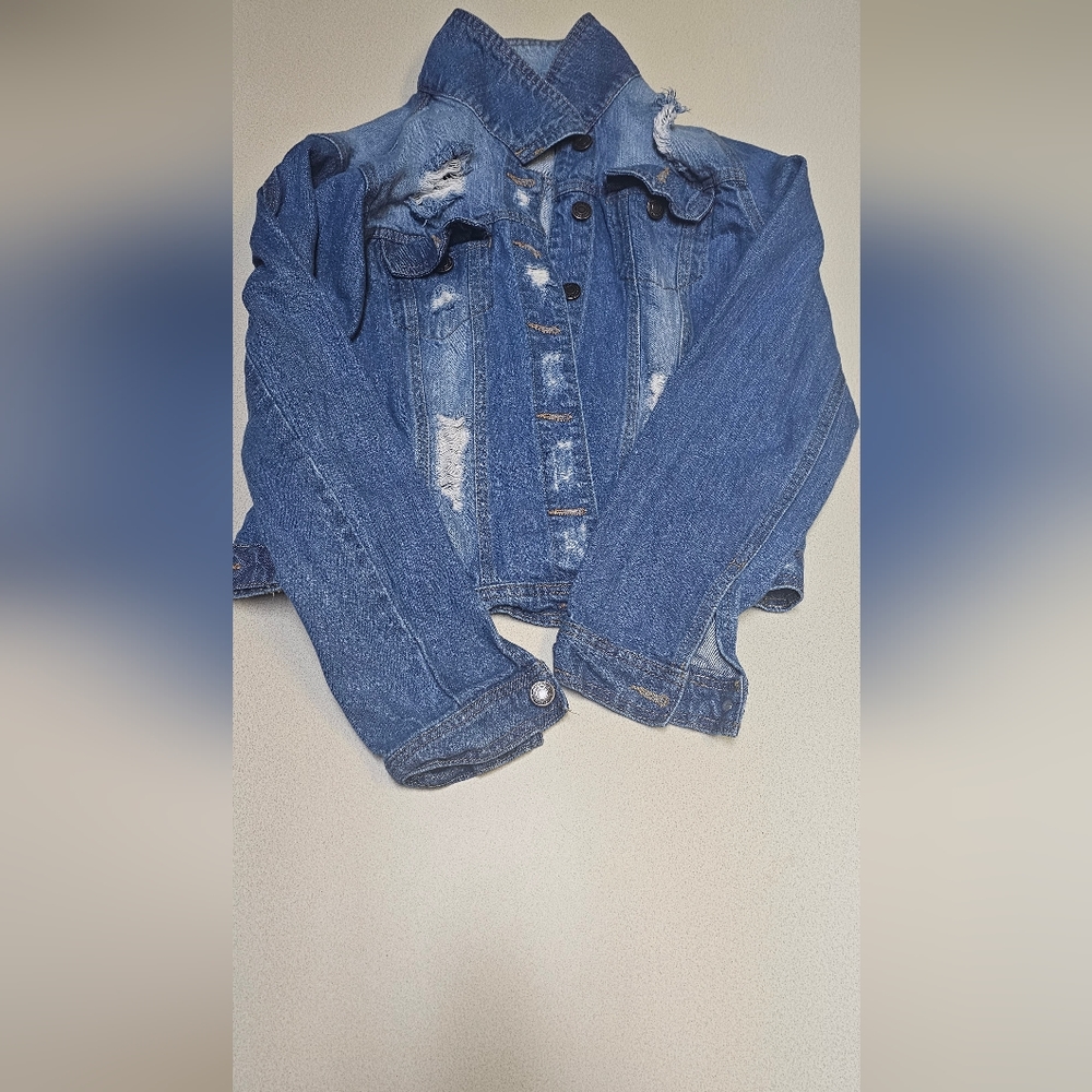 Girls(junior) wash Jean jacket with designer cut outs. Size(L).